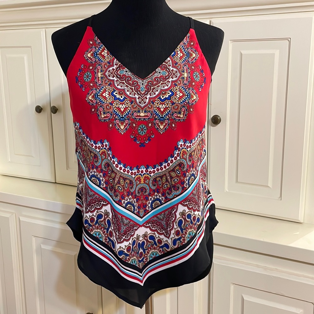 BCX spaghetti strap top with triangle bottom. Size small. Brand new condition.